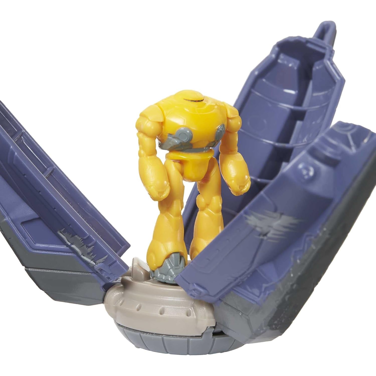 Juguete de cíclope amarillo en acción, vista frontal de la figura y su base