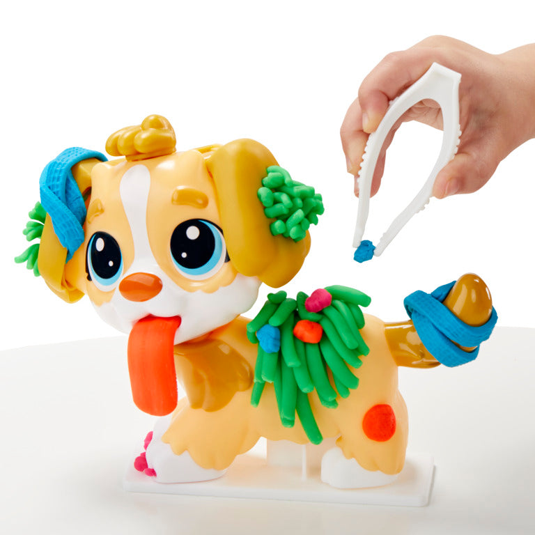 Perro Play Doh con accesorios coloridos, moldeando y creando formas divertidas.