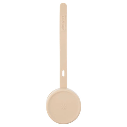Portachup SKIP*HOP color beige, diseño simple para fácil almacenamiento