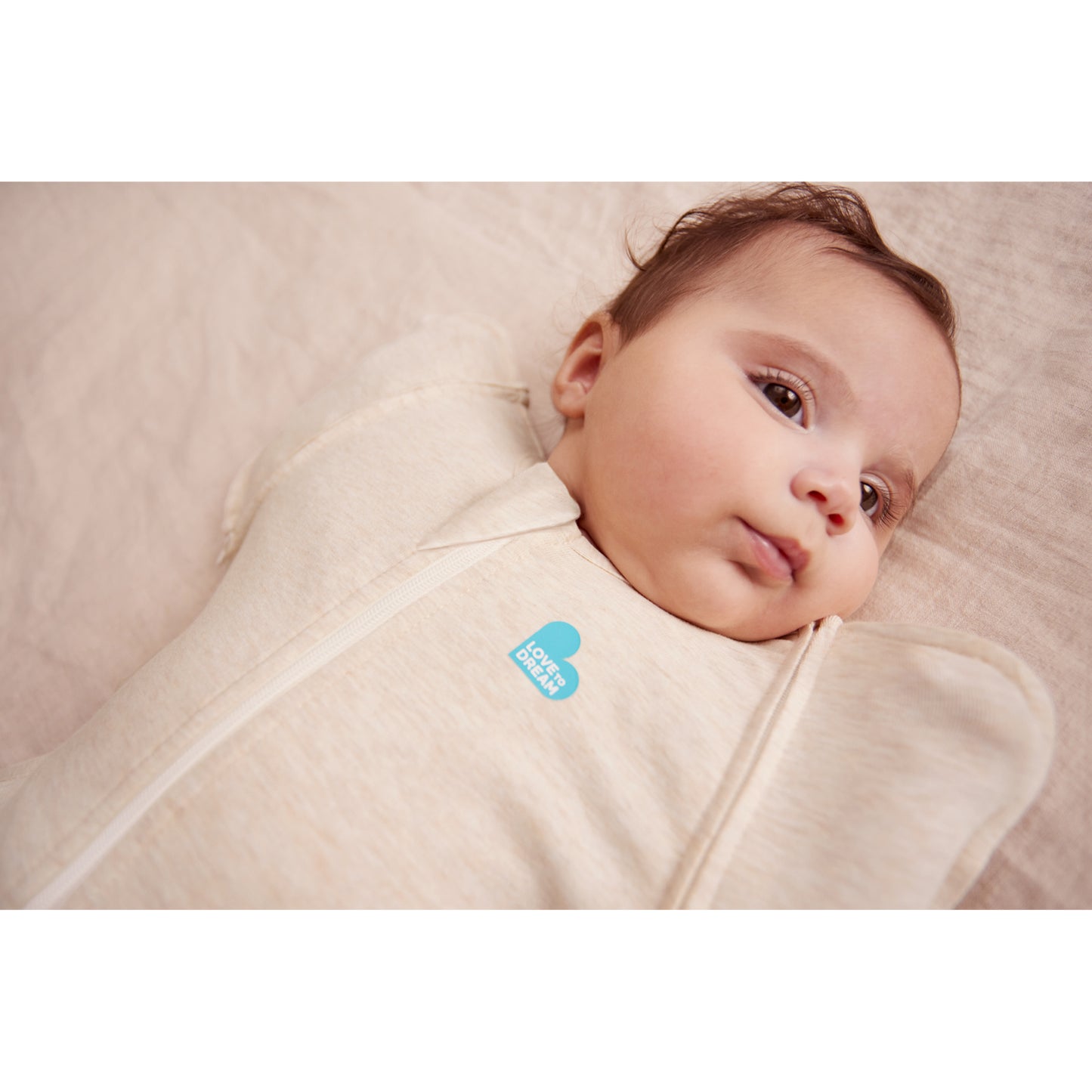 Saco para dormir LOVE TO DREAM en color crema con transición cómoda para bebés