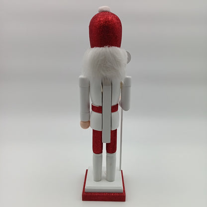 Set cascanuece rojo con detalles blancos, vista trasera, figura decorativa navideña