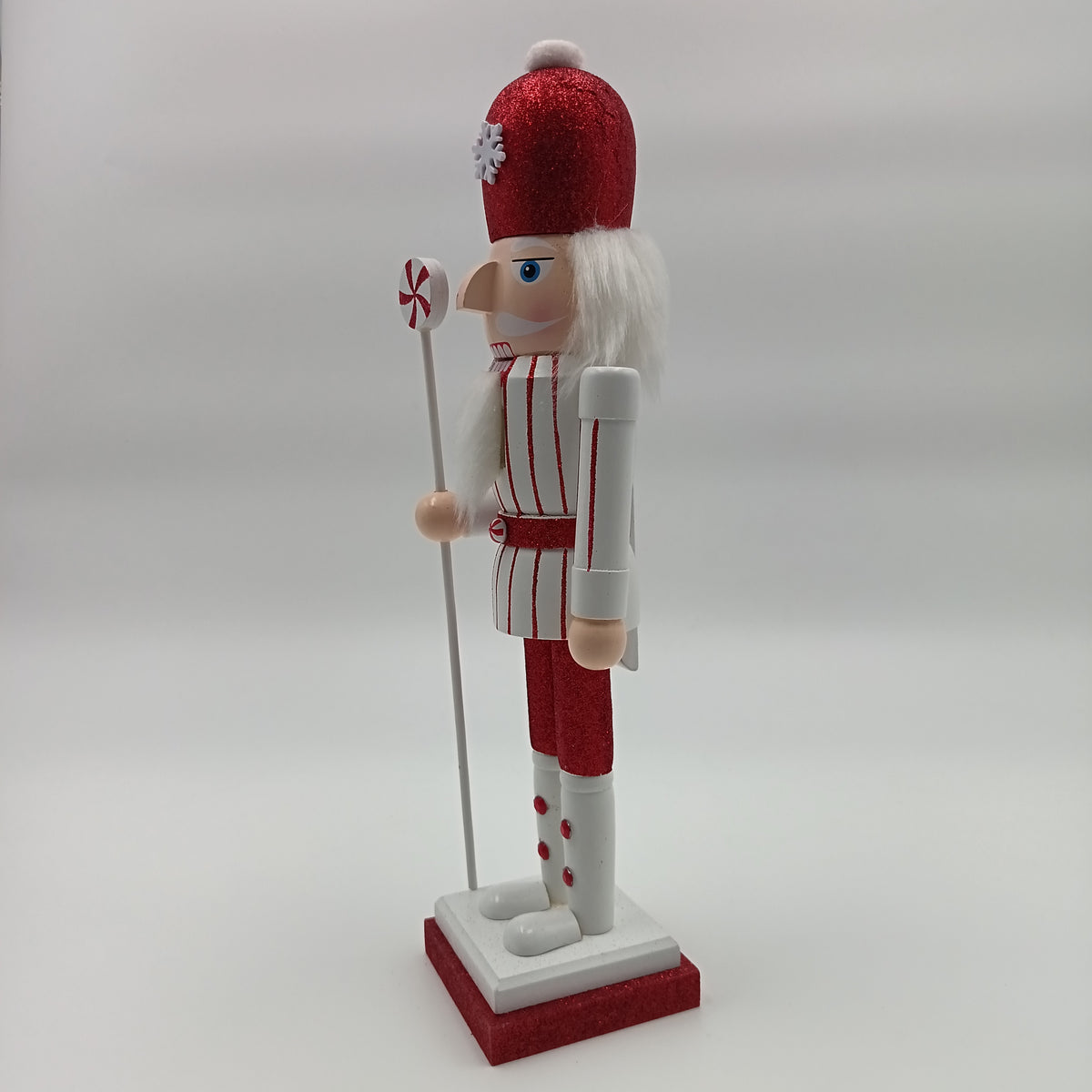 Set cascanuece figura de soldado navideño en colores rojo y blanco, decoración festiva