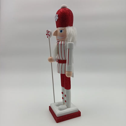 Set cascanuece figura de soldado navideño en colores rojo y blanco, decoración festiva