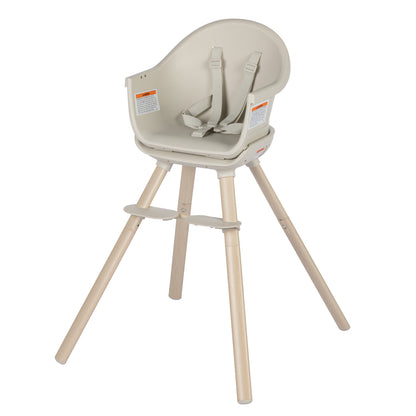 Silla de comer MAXI COSI color beige, vista lateral en un ambiente familiar