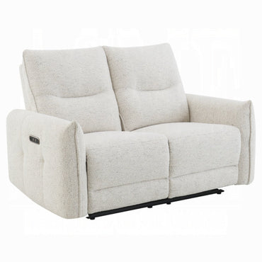 Sillon reclinable beige, vista lateral en sala moderna