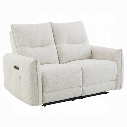 Sillon reclinable beige, vista lateral en sala moderna