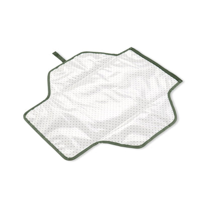 cambiador portátil blanco con borde verde, vista superior