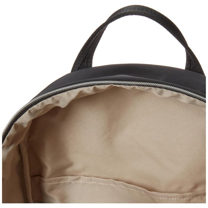 Mochila SKIP*HOP negra interior con acabado beige y cremallera abierta