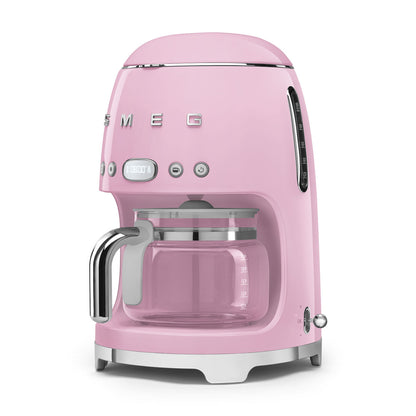 Cafetera SMEG rosa frontal, diseño retro, ideal para cocina moderna