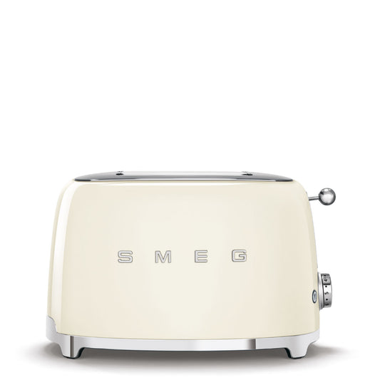 Tostadora SMEG blanca frontal, diseño retro y eficiente para cocina moderna