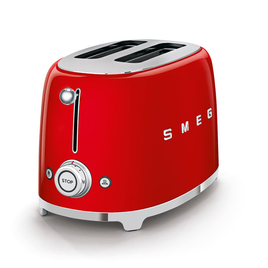 Tostadora roja SMEG vista frontal, diseño vintage en cocina moderna