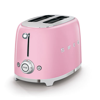 Tostadora SMEG rosa vista frontal en cocina moderna