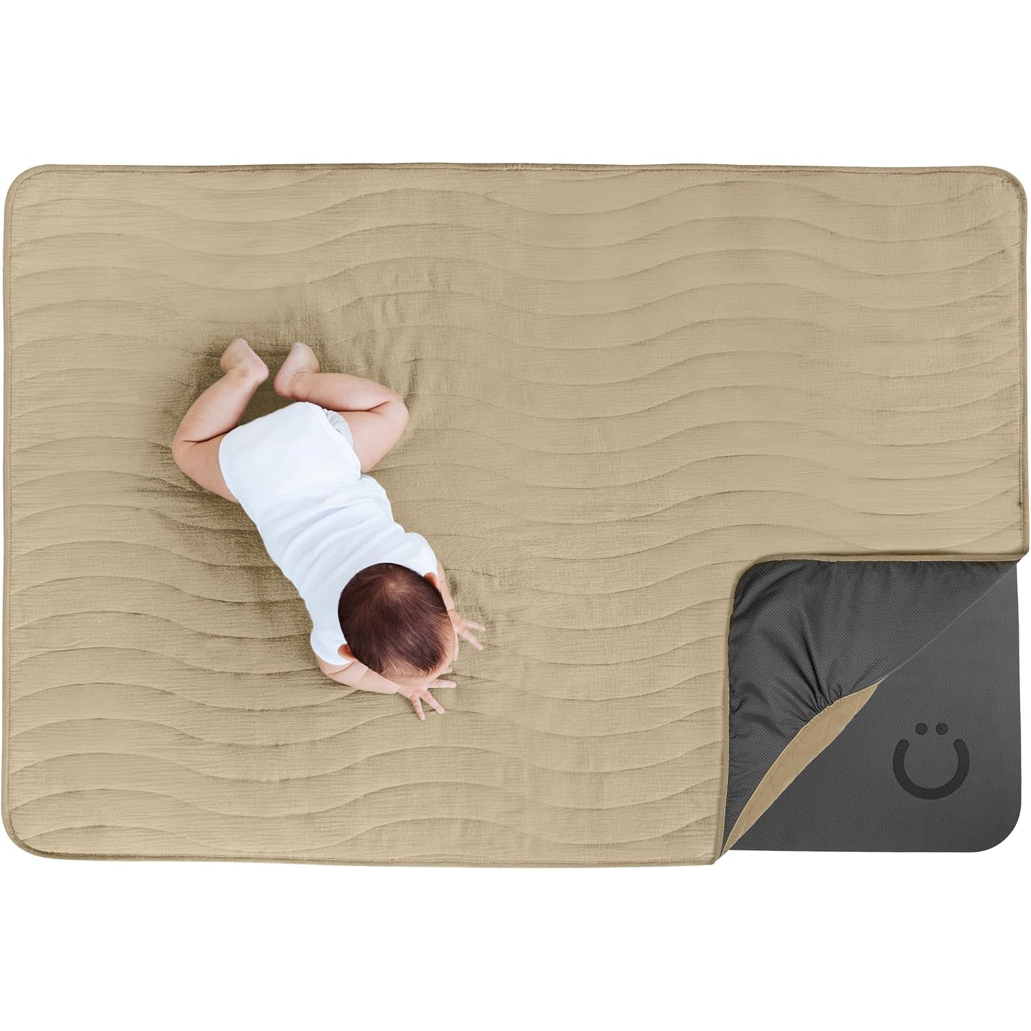 Manta para bebés color beige vista superior, ideal para jugar en casa